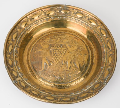 Lot 500 - Alms dish. A Nuremberg brass repoussé alms dish, 16th century