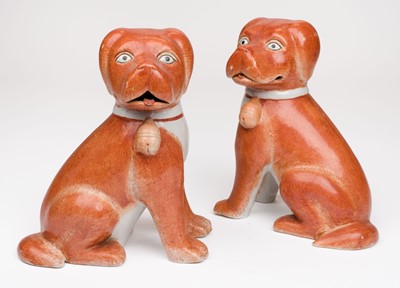 Lot 583 - Chinese Export. A pair of Chinese export porcelain models of spaniel pups