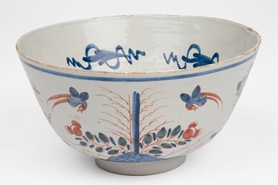 Lot 559 - Delft. A Dutch Delft polychrome punch bowl, 18th century