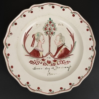 Lot 558 - Creamware. A Dutch decorated creamware plate, late 18th century