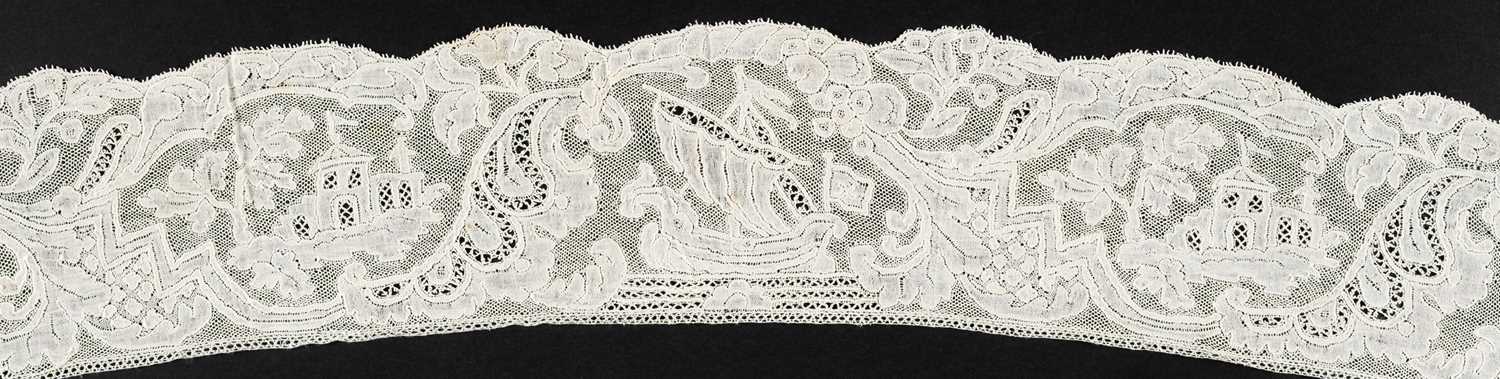 Lot 333 - Mechlin Lace. A length of lace depicting ships and castles, Flanders, circa 1730-1740, & 2 others