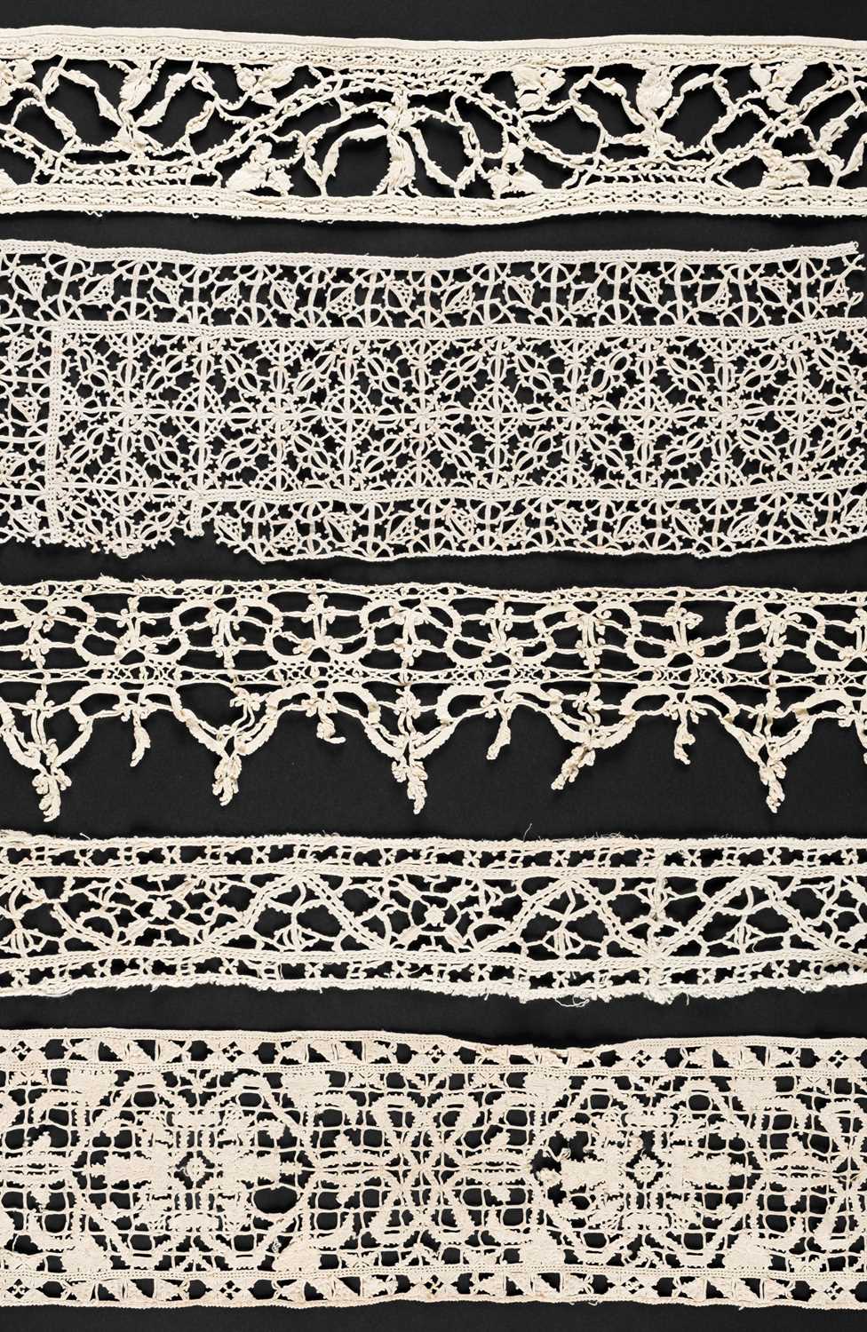 Lot 331 - Italian Lace. A wide cutwork border, late 16th/early 17th century, & other Italian lace