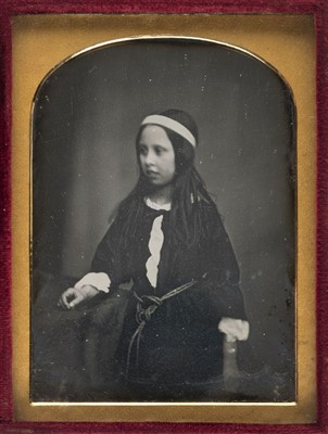 Lot 317 - Quarter-plate daguerreotype of a young girl with long ringlets