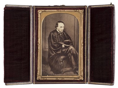 Lot 291 - Carte-de-visite-size ambrotype of a man and his seated wife