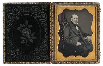 Lot 318 - Quarter-plate tinted portrait of a seated gentleman