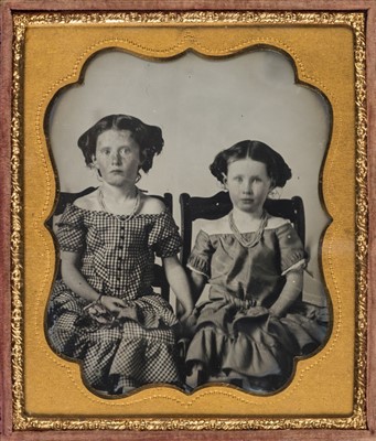 Lot 321 - Sixth-plate ambrotype of two little girls seated and holding hands