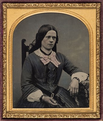 Lot 310 - Pair of sixth-plate ambrotypes of a young husband and wife